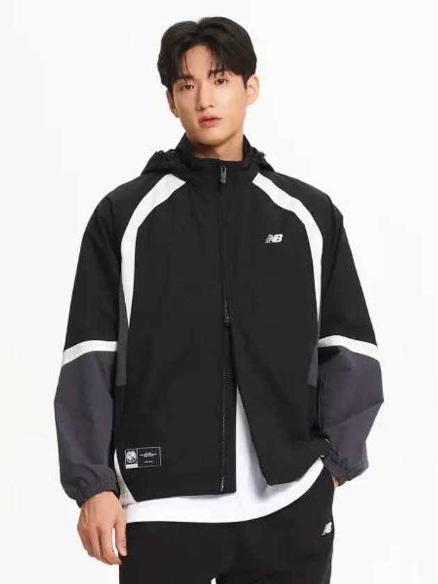 NBNAE32813 UNI N color block warm jacket BLACK - NEW BALANCE - BALAAN 1