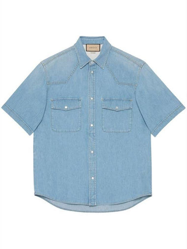 GUCCI ADD TIMELESS ELEGANCE TO ANY LOOK WITH THIS CLASSIC BLUE DENIM SHIRT. - GUCCI - BALAAN 1