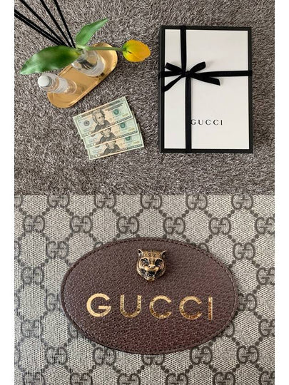 GG Supreme Jaguar gold clutch bag - GUCCI - BALAAN 2