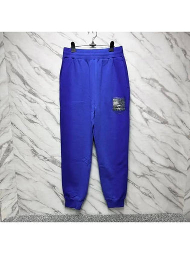 A COLD WALL Men s Blue Foil Grid Track Sweatpants AC223MPT131I - A-COLD-WALL - BALAAN 1