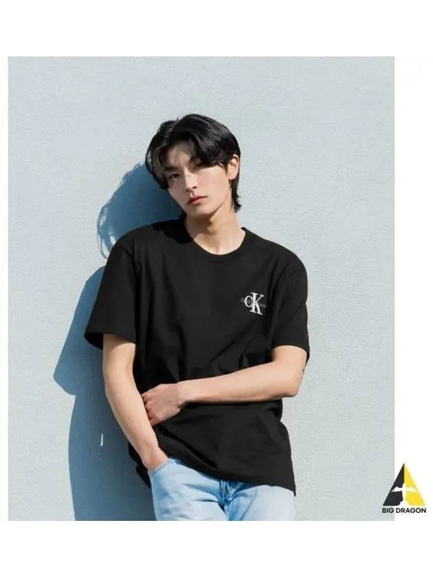 JEANS Men s Black Relaxed Fit Embossed Logo Short Sleeve T Shirt J325510 BEH - CALVIN KLEIN - BALAAN 1