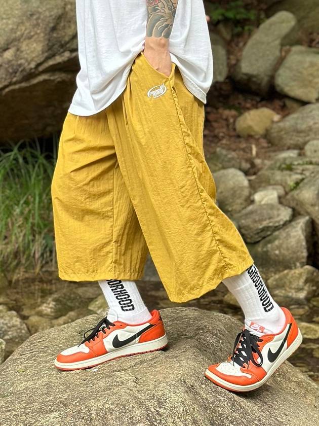 NYLON TWO TUCK BERMUDA PANTS MUSTARD - PEACEOFMIND - BALAAN 1