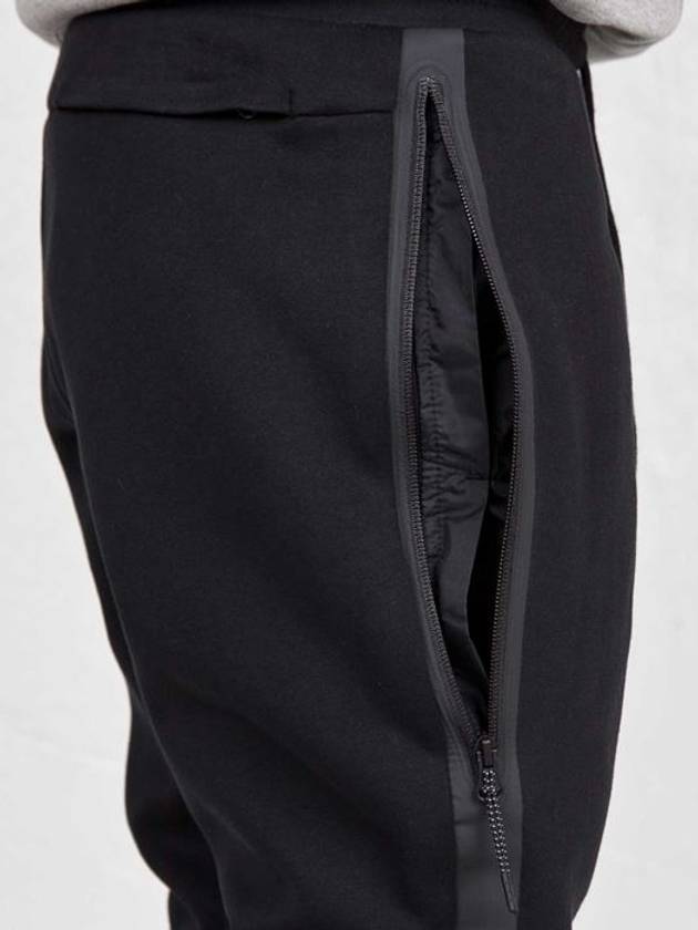 01545344011Tech Pack 10 Fleece Long PantsBlack - NIKE - BALAAN 10