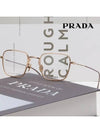 eyewear titanium glasses gold - PRADA - BALAAN 3