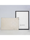 Embossed GG Detail Strap Leather Clutch Ivory 6255691W3AN9022 - GUCCI - BALAAN 1