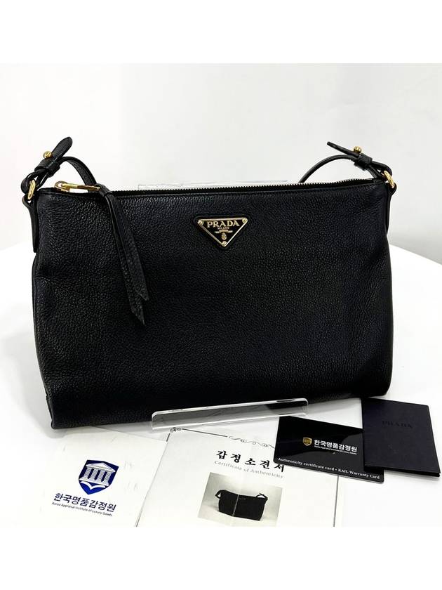 Vitello Dino triangle logo cross bag black - PRADA - BALAAN 1