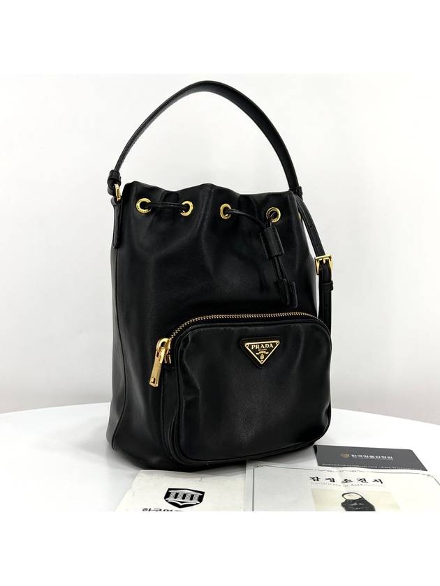 Leather triangle logo bucket bag black - PRADA - BALAAN 3