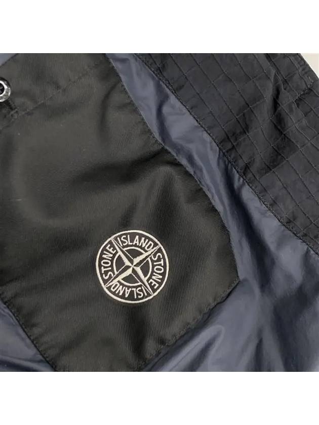 Macro Ripstop Nylon Metal Down Jacket Black - STONE ISLAND - BALAAN 9