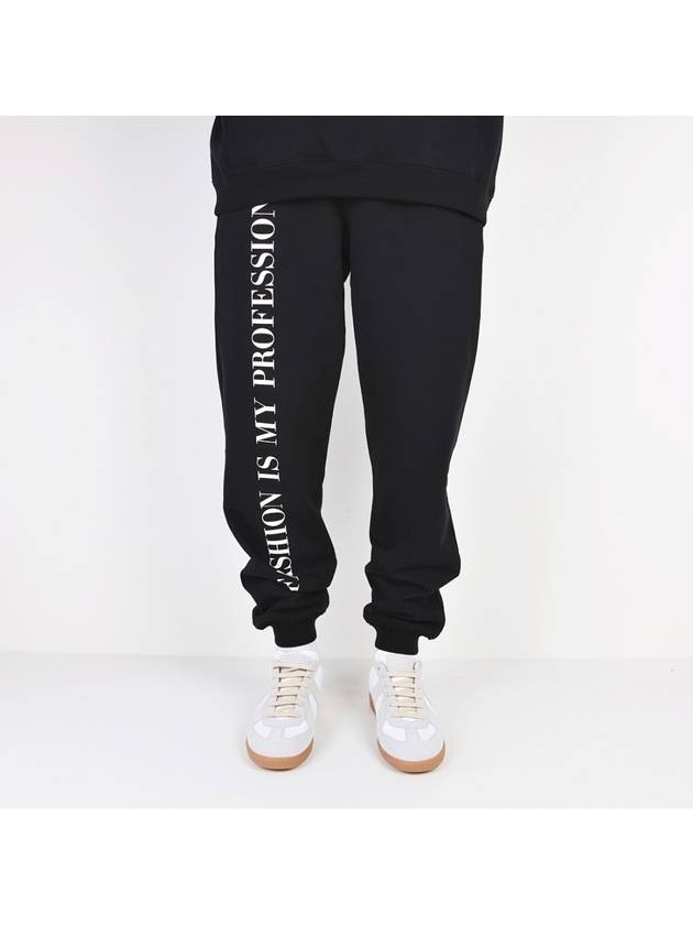 Lettering Printed Cotton Track Pants Black - VETEMENTS - BALAAN.