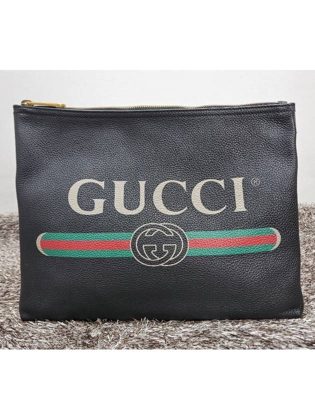 Belted logo print clutch bag - GUCCI - BALAAN 1