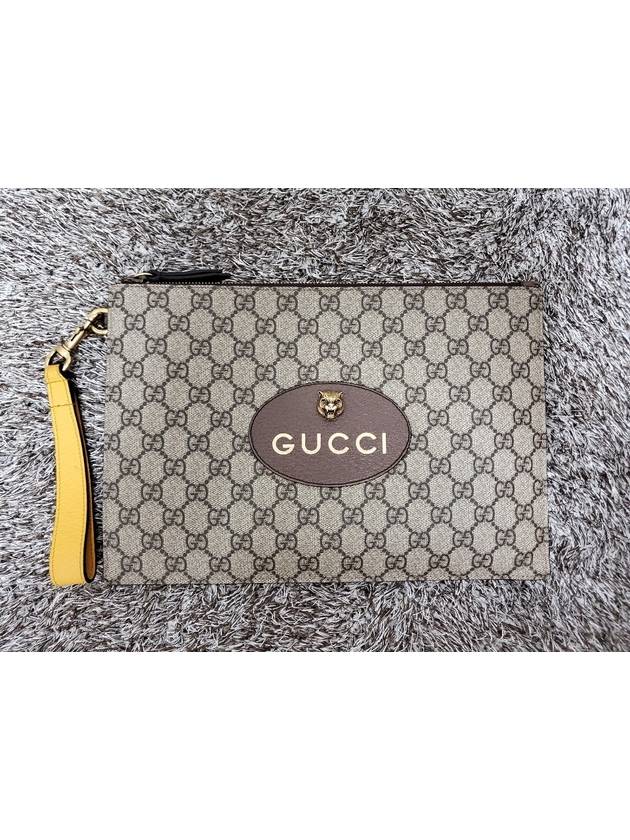 GG Supreme Jaguar gold clutch bag - GUCCI - BALAAN 3