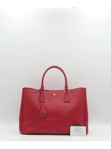 BN1844 SAFFIANO LUX red triangle gold logo tote bag - PRADA - BALAAN 1