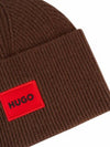 Green Ribbed beanie hat with red logo label 50496011 202 - HUGO BOSS - BALAAN 3