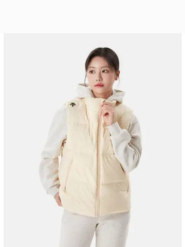 Seunghyeop Lee wearing Essential Puffer Down Vest Yellow SP323UDV91 - DESCENTE - BALAAN 1