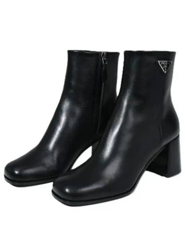 1T232N F 065 70 F0002 Leather Boots - PRADA - BALAAN 1