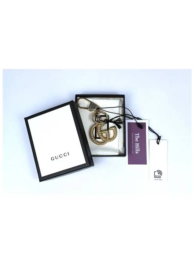 GG logo key holder gold - GUCCI - BALAAN.