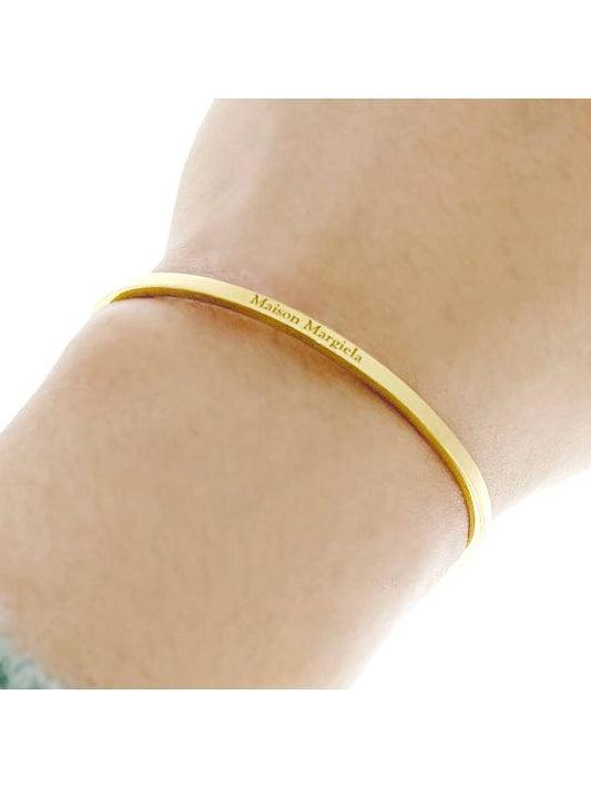 Logo Cuff Bracelet Gold - MAISON MARGIELA - BALAAN.