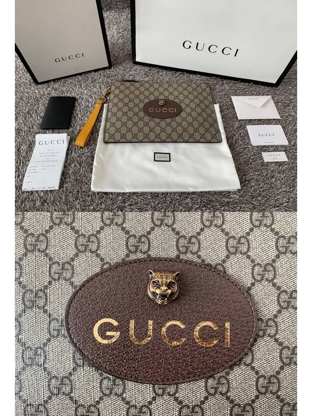 GG Supreme Jaguar gold clutch bag - GUCCI - BALAAN 2