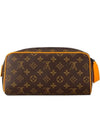 Dopp Kit Monogram Macassar Saffron Orange - LOUIS VUITTON - BALAAN 1