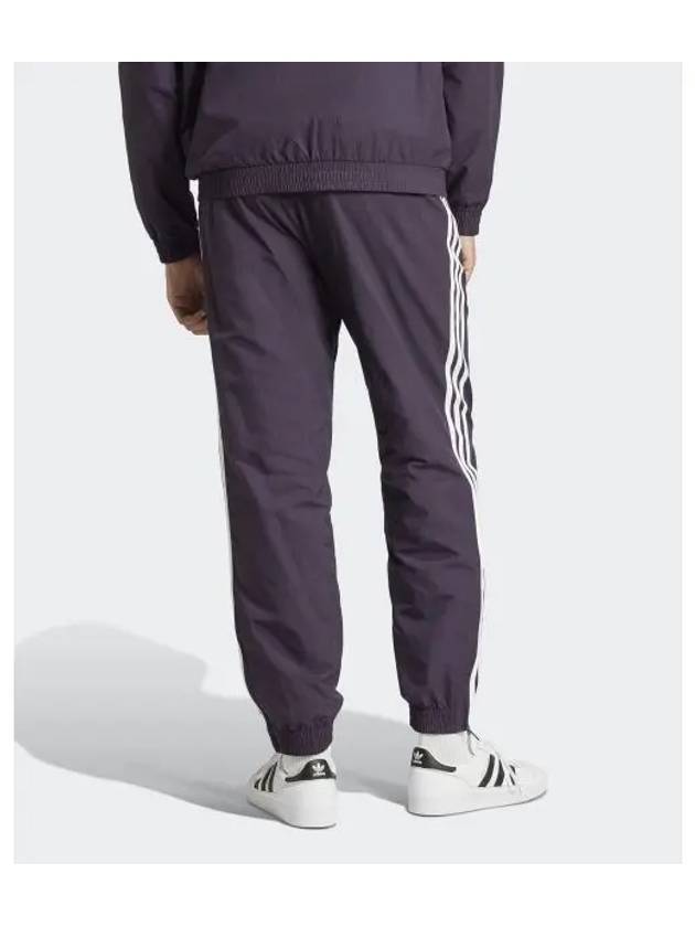 Woven Firebird Track Pants Deep Purple - ADIDAS - BALAAN 1