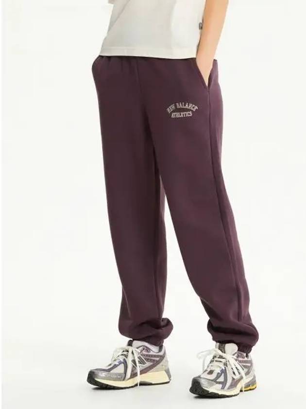 NBMLE4S032 WOMEN Arched graphic brushed jogger pants PURPLE - NEW BALANCE - BALAAN 1