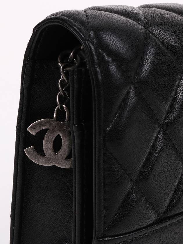 Black calfskin logo WOC cross bag - CHANEL - BALAAN 4