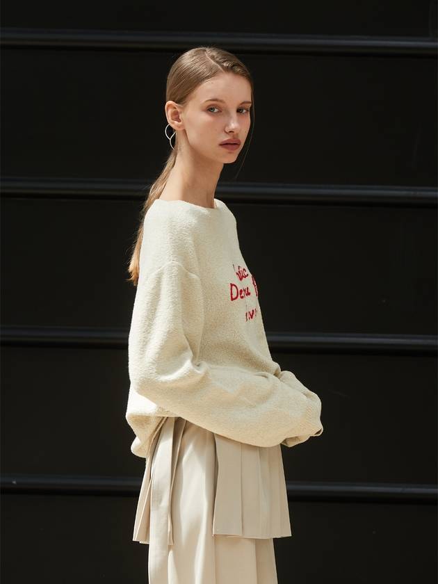 Minnie wearing ANC EMBROIDERY BOATNECK KNIT IVORY - ANOETIC - BALAAN 5