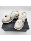 Women CC Logo Fabric Laminated Low Top Sneakers Silver Ivory - CHANEL - BALAAN 4