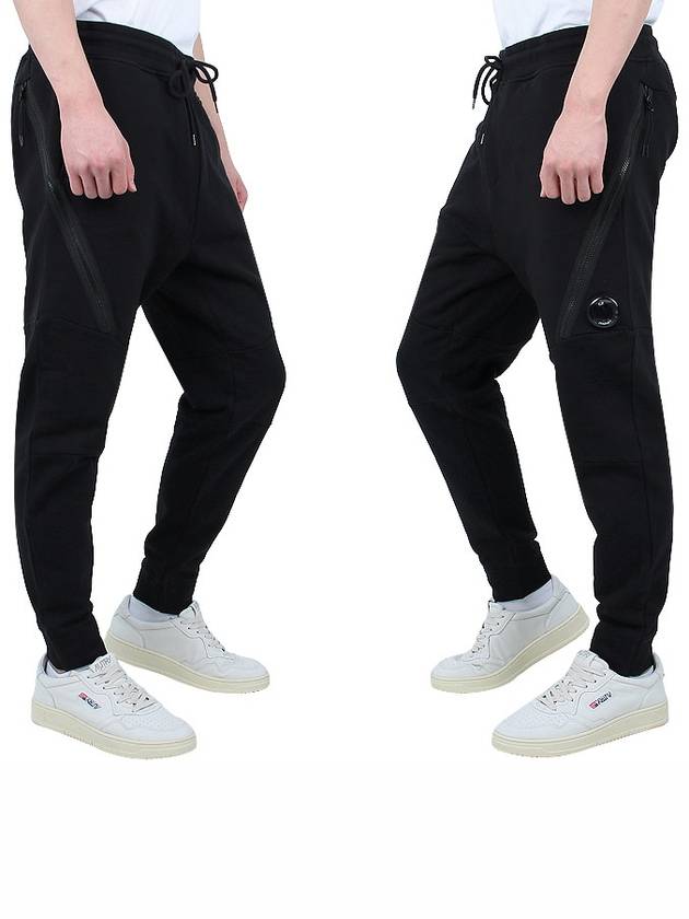 Diagonal Raised Fleece Zipped Track Pants Black - CP COMPANY - 4