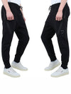 Diagonal Raised Fleece Zipped Track Pants Black - CP COMPANY - BALAAN 4