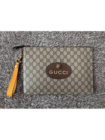 GG Supreme Jaguar gold clutch bag - GUCCI - BALAAN 1