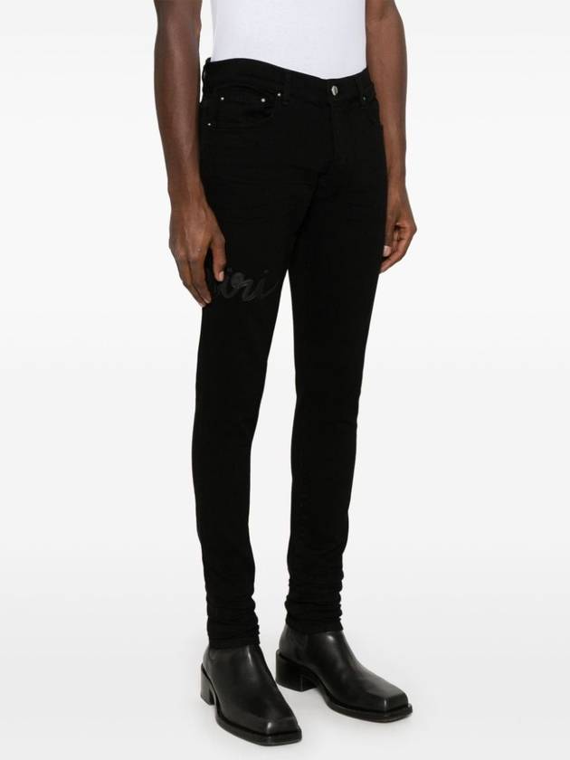 AMIRI AMIRI SCRIPT LOGO SKINNY JEAN - AMIRI - BALAAN 3