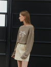 Minnie wearing ANC EMBROIDERY BOATNECK KNIT BROWN - ANOETIC - BALAAN 2