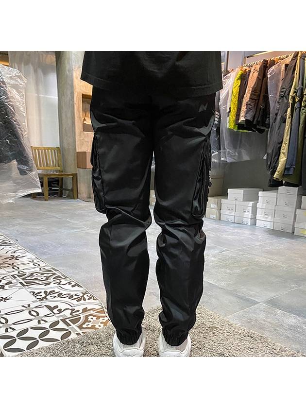 Re-Nylon Buckle Strap Pocket Track Pants Black - PRADA - BALAAN.