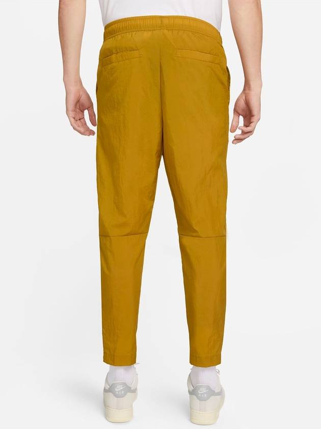 Men's Club Woven Lightweight Track Pants Bronzine - NIKE - BALAAN 3