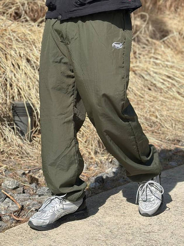 LOGO NYLON WIDE TRACK PANTS KHAKI - PEACEOFMIND - BALAAN 1