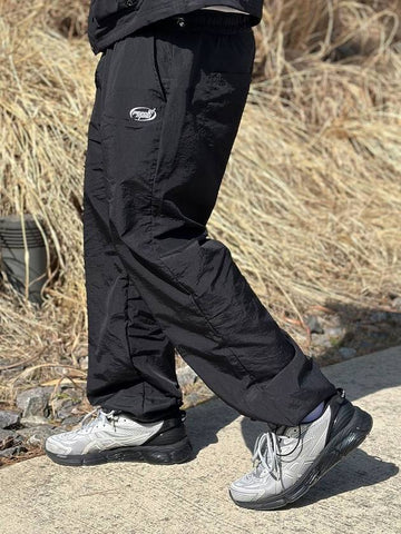 LOGO NYLON WIDE TRACK PANTS BLACK - PEACEOFMIND - BALAAN 1