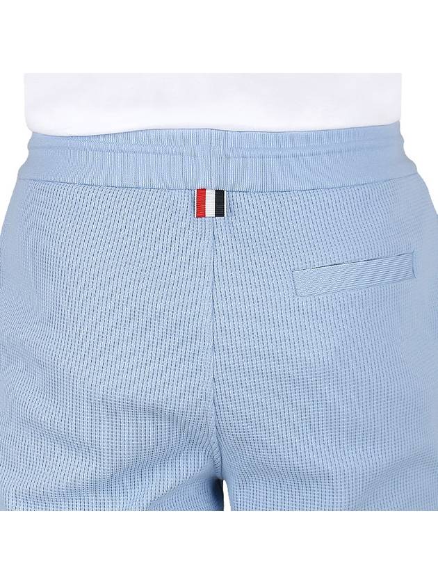 Men's Diagonal Stripe Waffle Track Pants Blue - THOM BROWNE - 9