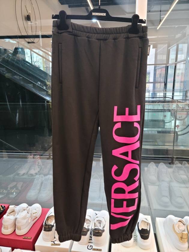 Women's Lettering Track Pants Black - VERSACE - BALAAN.