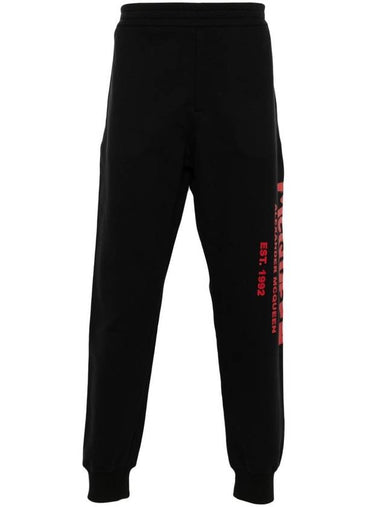 ALEXANDER MCQUEEN GRAFFITI PRINT JOGGERS - ALEXANDER MCQUEEN - BALAAN 1