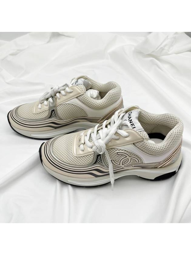 Women CC Logo Fabric Laminated Low Top Sneakers Silver Ivory - CHANEL - BALAAN 8