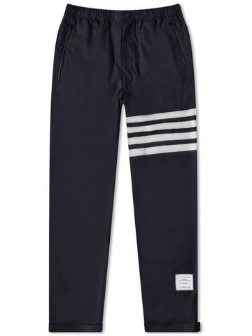 4 Bar Stripe Plain Weaving Track Pants Navy - THOM BROWNE - BALAAN.