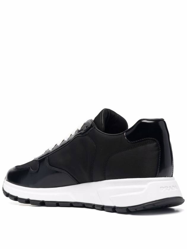 Re-Nylon Triangle-logo low-top sneakers - PRADA - BALAAN 3