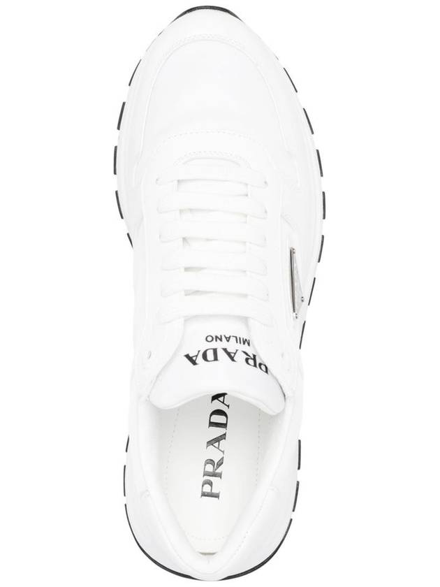 side logo-plaque low-top sneakers - PRADA - BALAAN 4