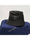 Triangle Logo Re-nylon Bucket Hat Black - PRADA - BALAAN 7