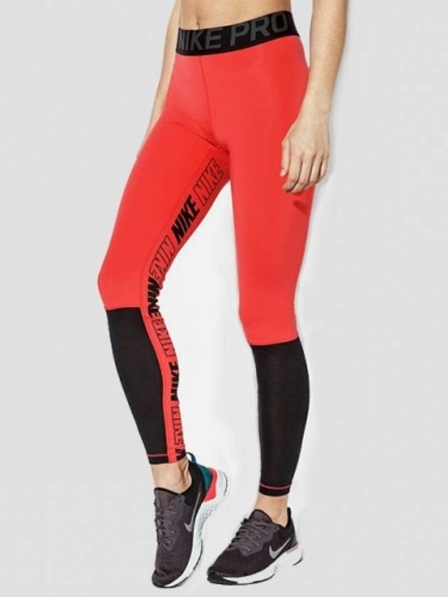 01AQ0068850Women’sPro Sports District Tights LeggingsOrange Black - NIKE - BALAAN 1