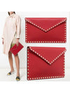 Rockstud Pouch Clutch Bag Red - VALENTINO - BALAAN.