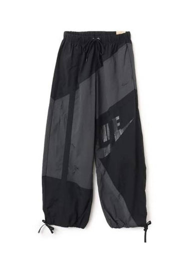 Women's Mid-Rise Loose Woven Open-Hem Track Pants Anthracite - NIKE - BALAAN 1