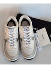 Women CC Logo Fabric Laminated Low Top Sneakers Silver Ivory - CHANEL - BALAAN 10