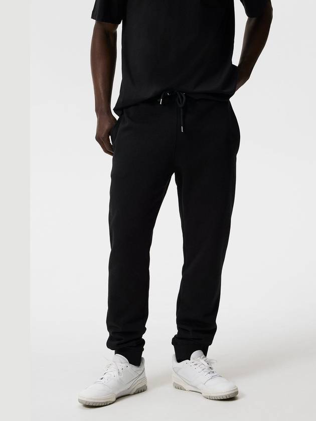 Alpha Logo Print Track Pants Black - J.LINDEBERG - BALAAN 3